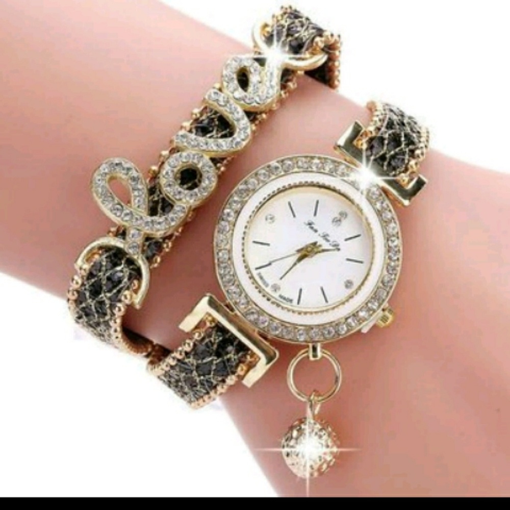 Nice Ladies Blk. And Gold Bracelet Watch